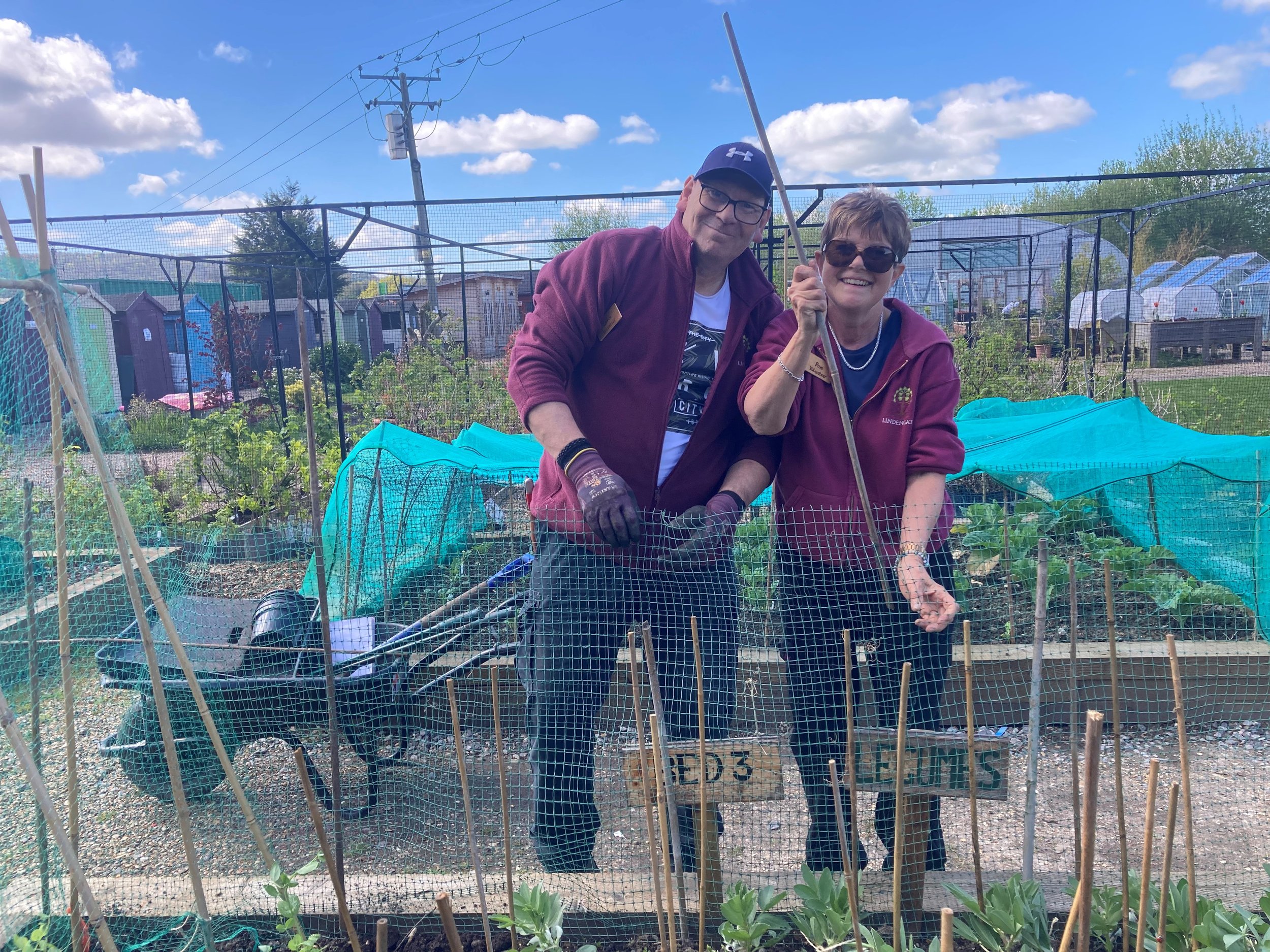 Pam and Gav photo consent in the kitchen garden.jpg