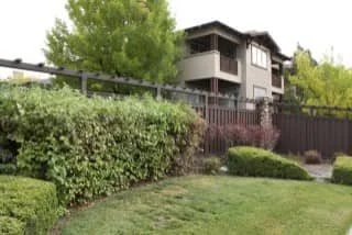 Residential building with greenery and lawn