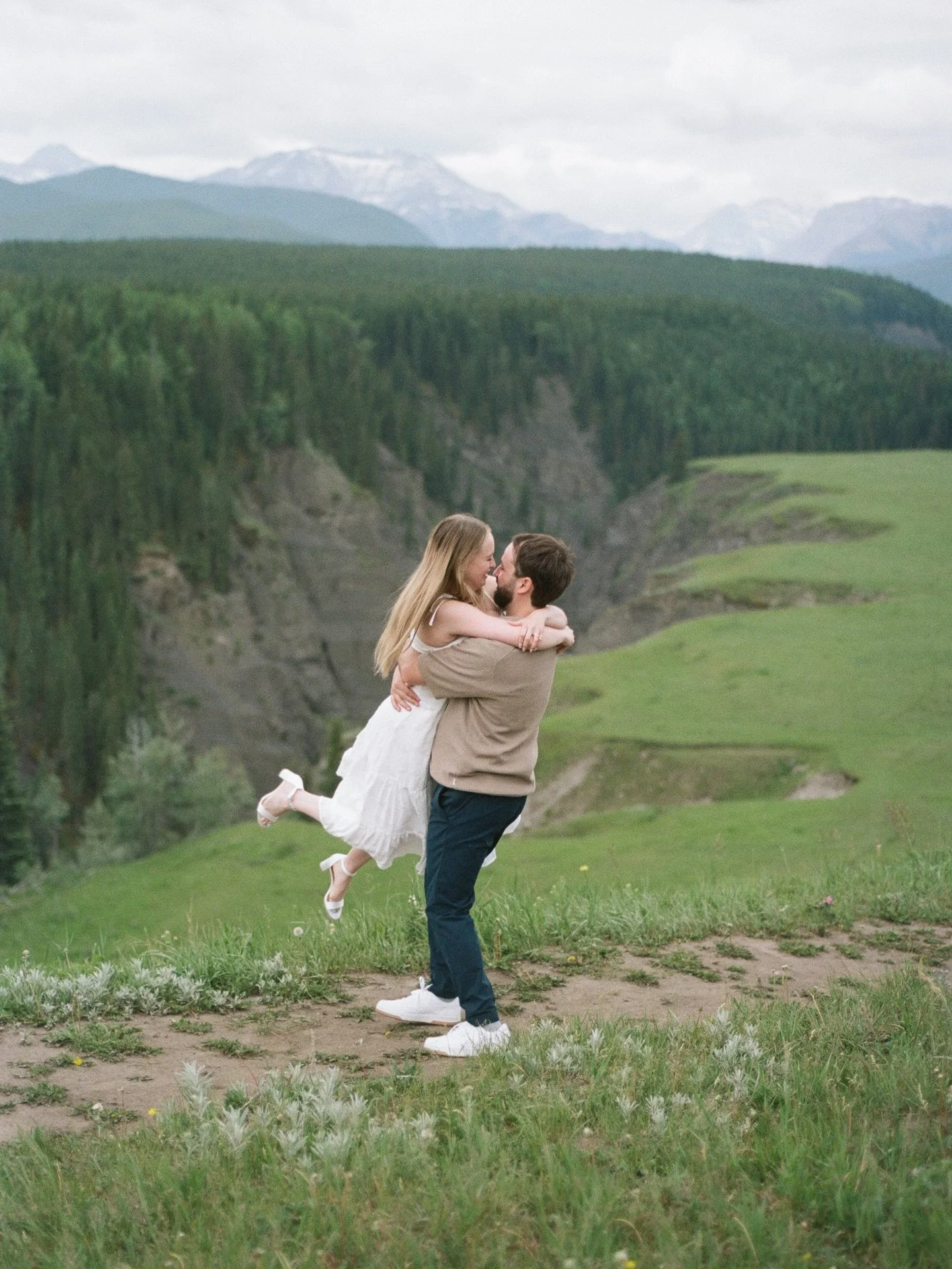 Jasmin &amp; Alex are getting married tomorrow! So grateful for these two angels for driving me to the magical bighorn lookout (my first time!) for their engagement session - on film of course! 🏔️🐏🌿🌸