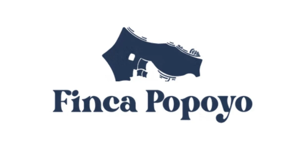 Logo with a dark blue stylized depiction of a farm landscape and the words "Finca Popoyo" written below in dark blue text.
