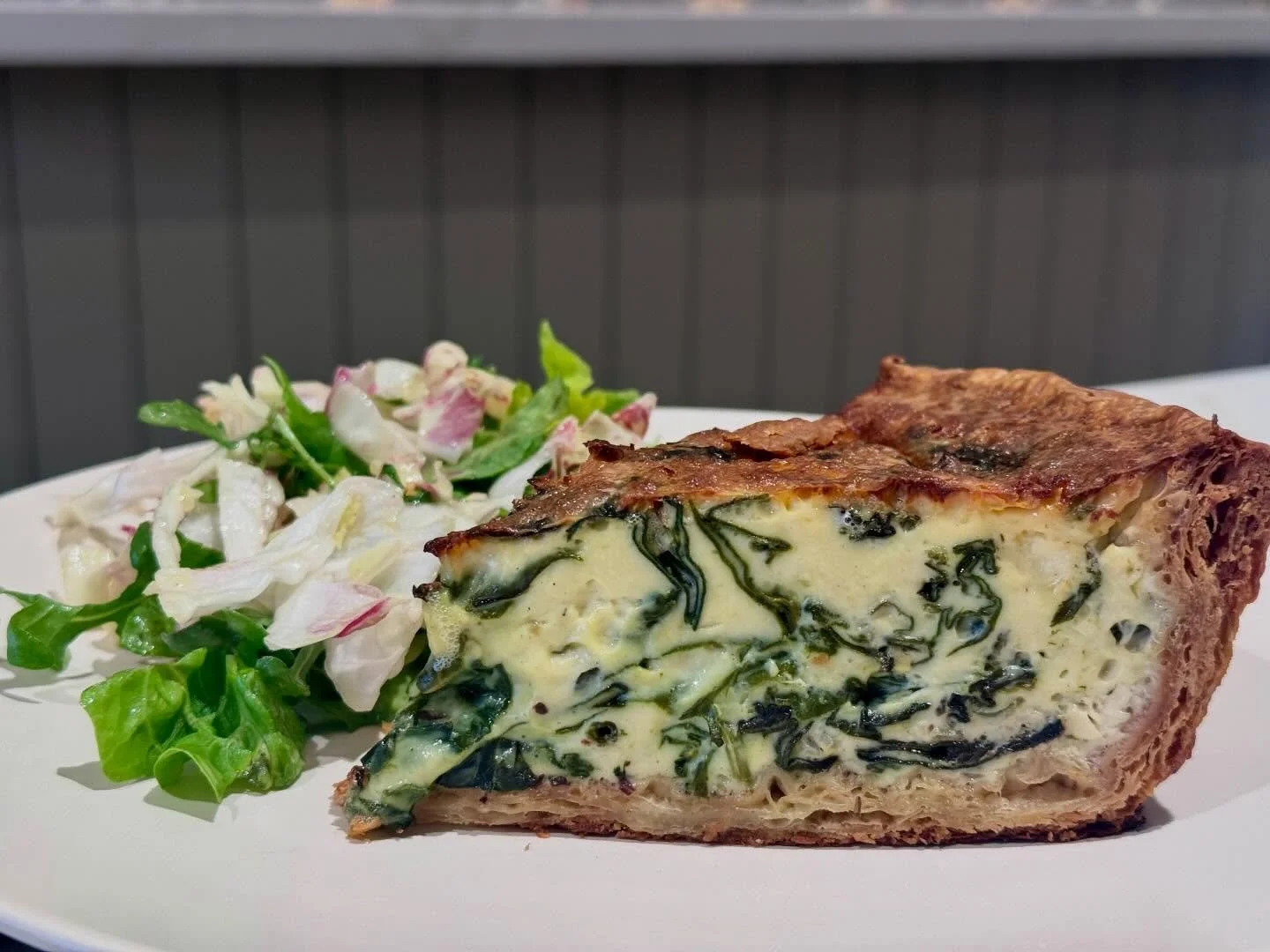 Spiced Greens, Feta &amp; Shallot Quiche!

Swiss chard, spinach &amp; shallots saut&eacute;ed with cumin seeds, ground coriander &amp; red pepper flakes, feta cheese all in a super flaky tart dough.