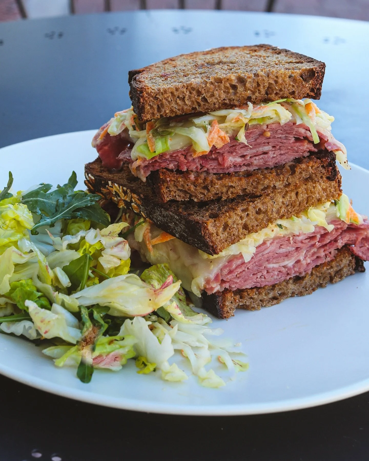 Corned beef stacked on fresh-baked Guinness&reg; Whole Grain Sourdough, layered with melted provolone and finished with our house-spiced slaw.

Savory, hearty, and made for lunch.
Available now through St. Patrick&rsquo;s Day. ☘️

#thebakernextdoor #