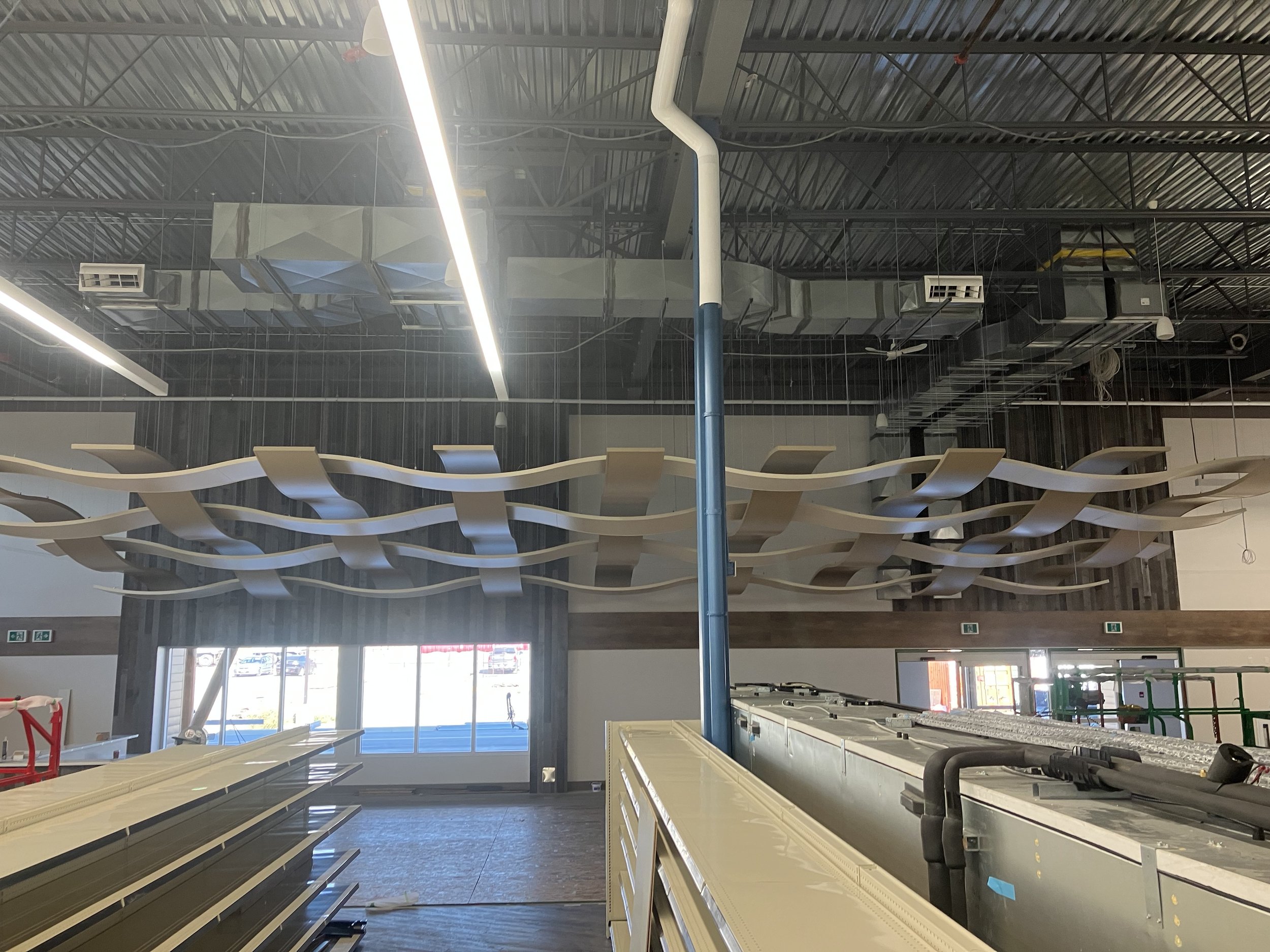 Sweláps Market, completed Armstrong Serpentina ceiling tile installation