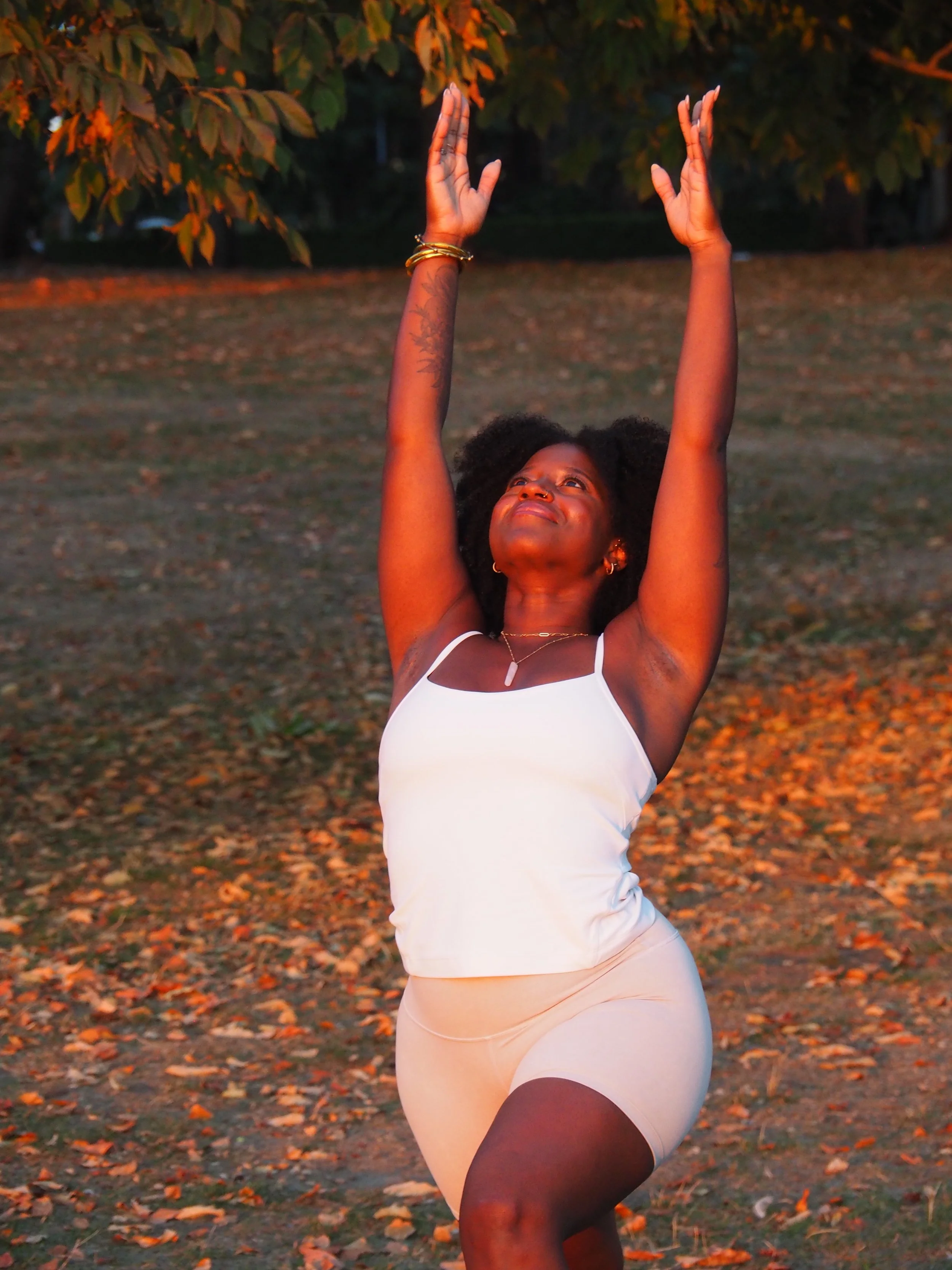 Yoga teacher in crescent lunge yoga pose