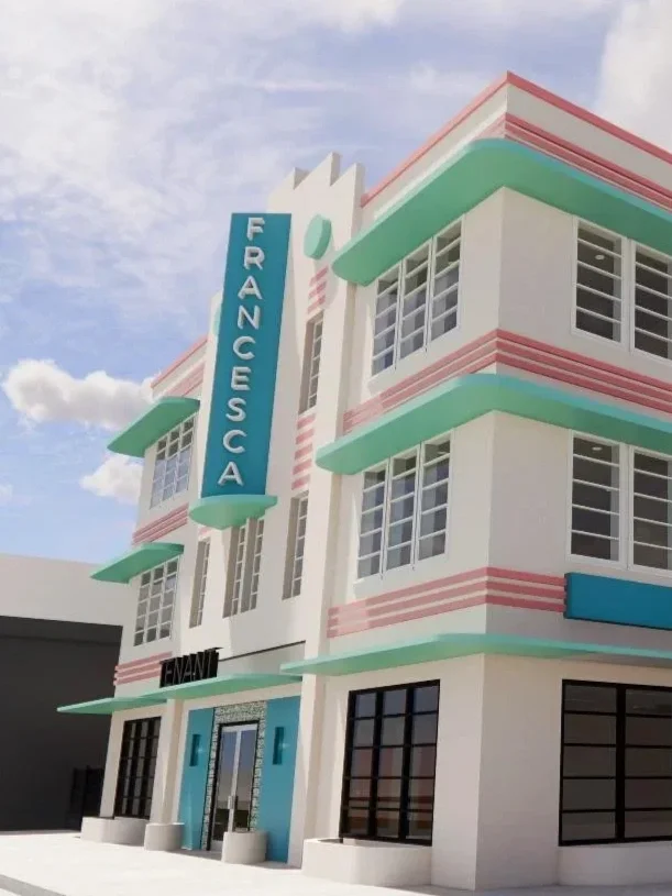 Art Deco style building with pastel green awnings, pink horizontal accents, and a vertical blue sign that reads "FRANCESCA." Small sign below the sign reads "ENAME." The building has multiple windows and a glass entrance door.