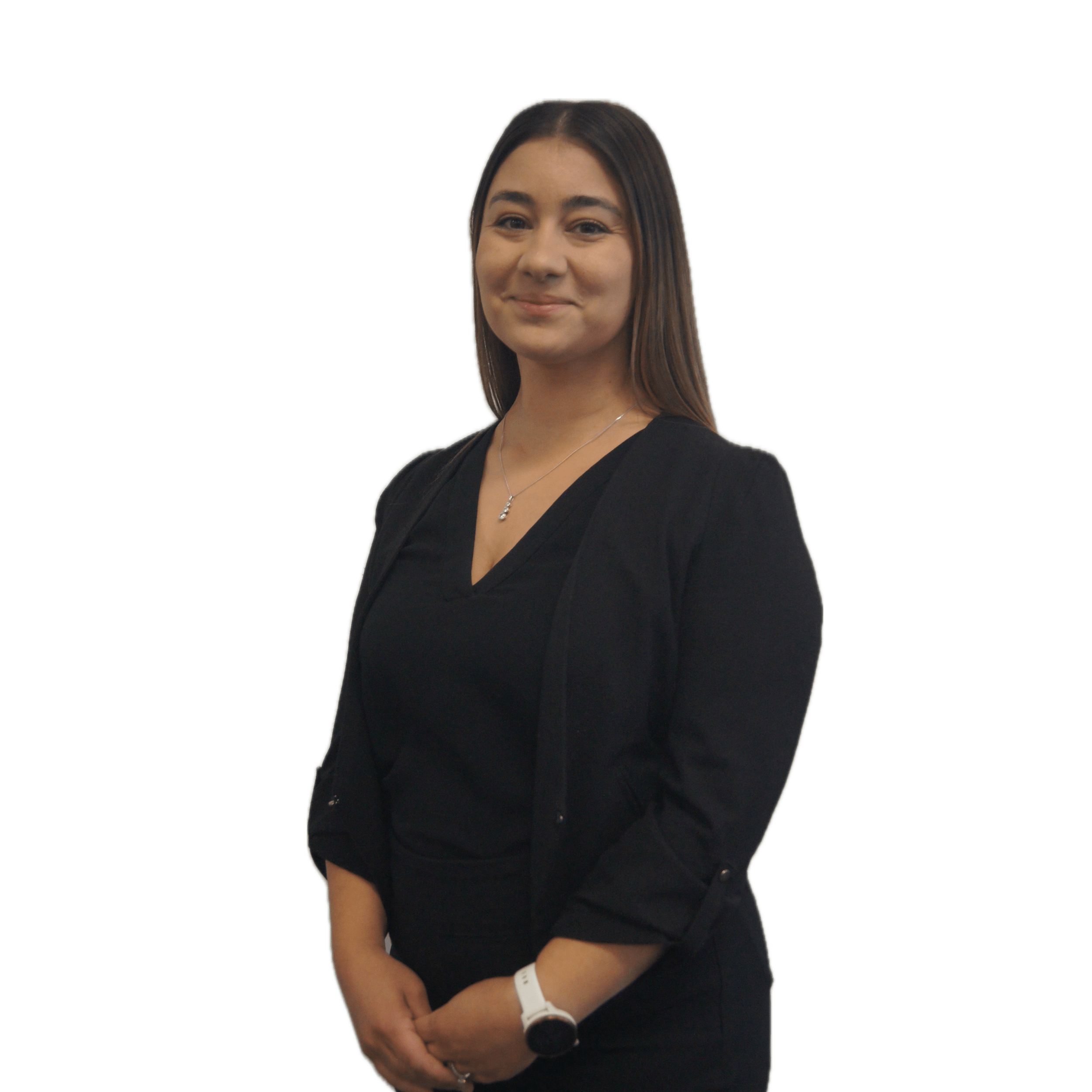 Young woman with long brown hair smiling, wearing a black blazer, black top, a silver necklace, and a white watch, standing against a transparent background.