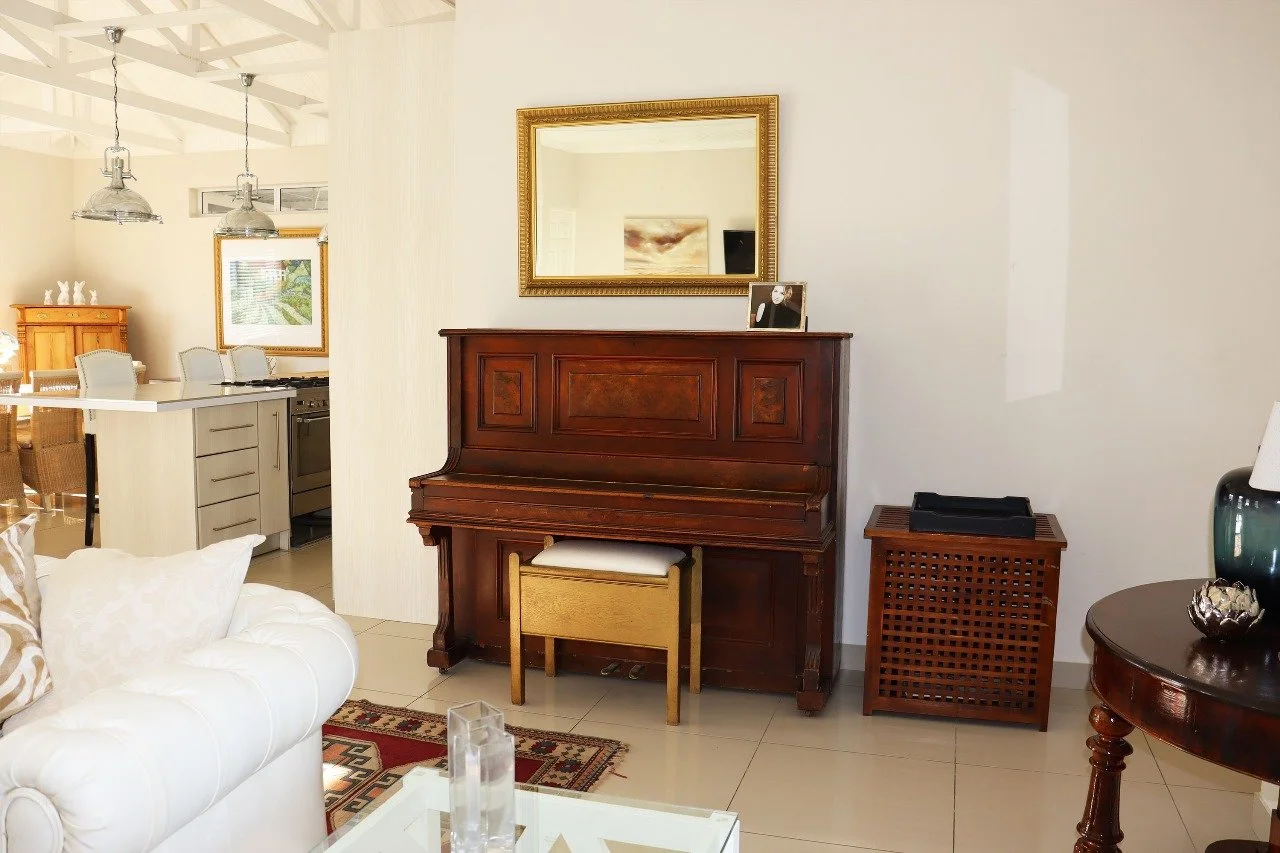 piano, open plan living area