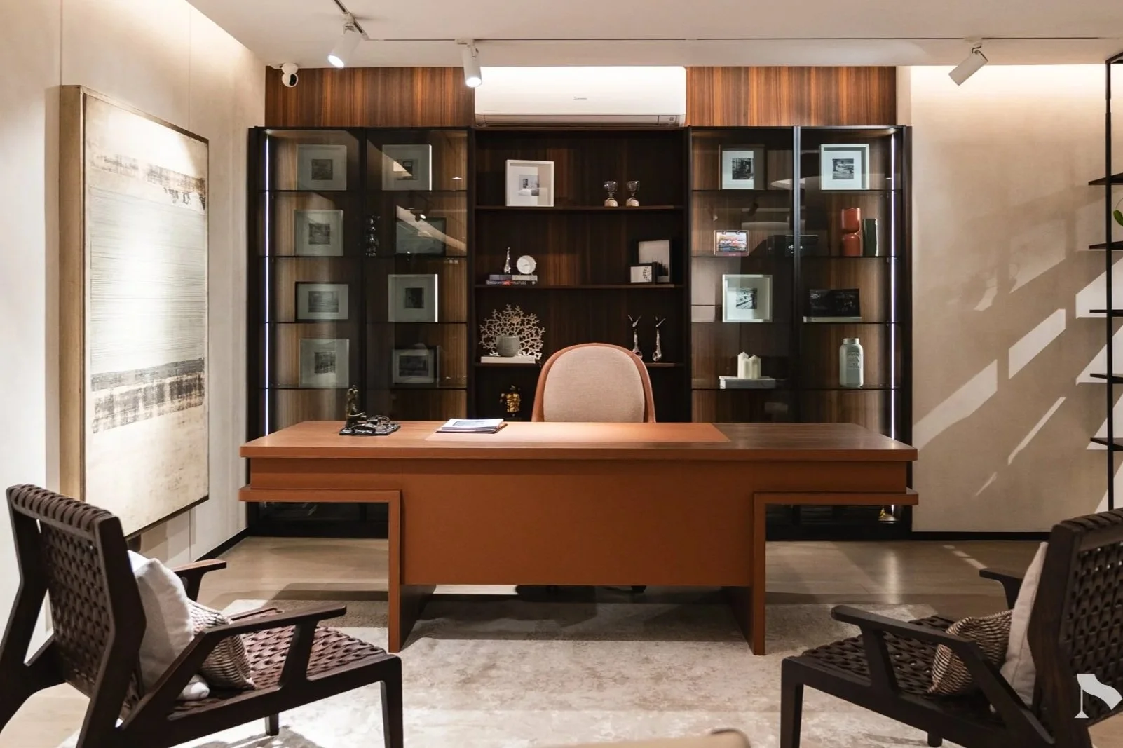 Our office space features Turri furnitures, namely the Eco Office Desk and Executive Chair by Giuseppe Vigano, and Net Saddle Armchairs by Matteo Nunziati. The shelves are custom modulars by Pedini. 