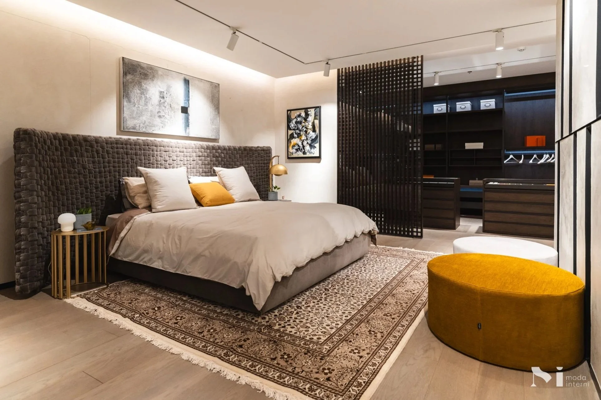 Our bedroom space features the Azul bed by Turri, designed by Paola Navone. The side tables are from the Roma Collection by Monica Armani 