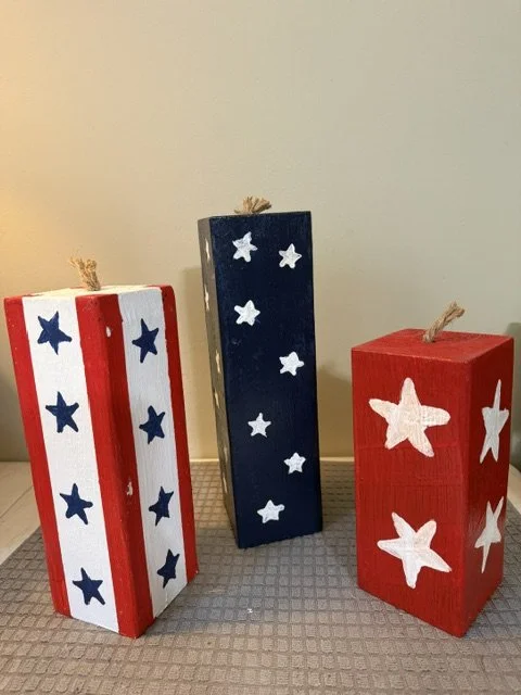 Tall wooden Firecracker's, sold together in a set of 3.