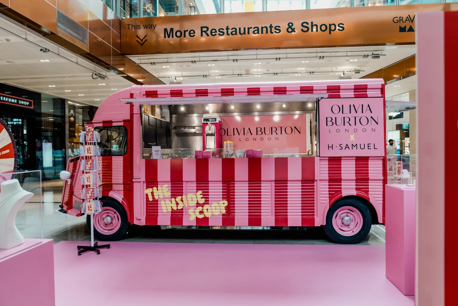 Pink and red Olivia Burton x H.Samuel Citroën HY truck on custom pink flooring