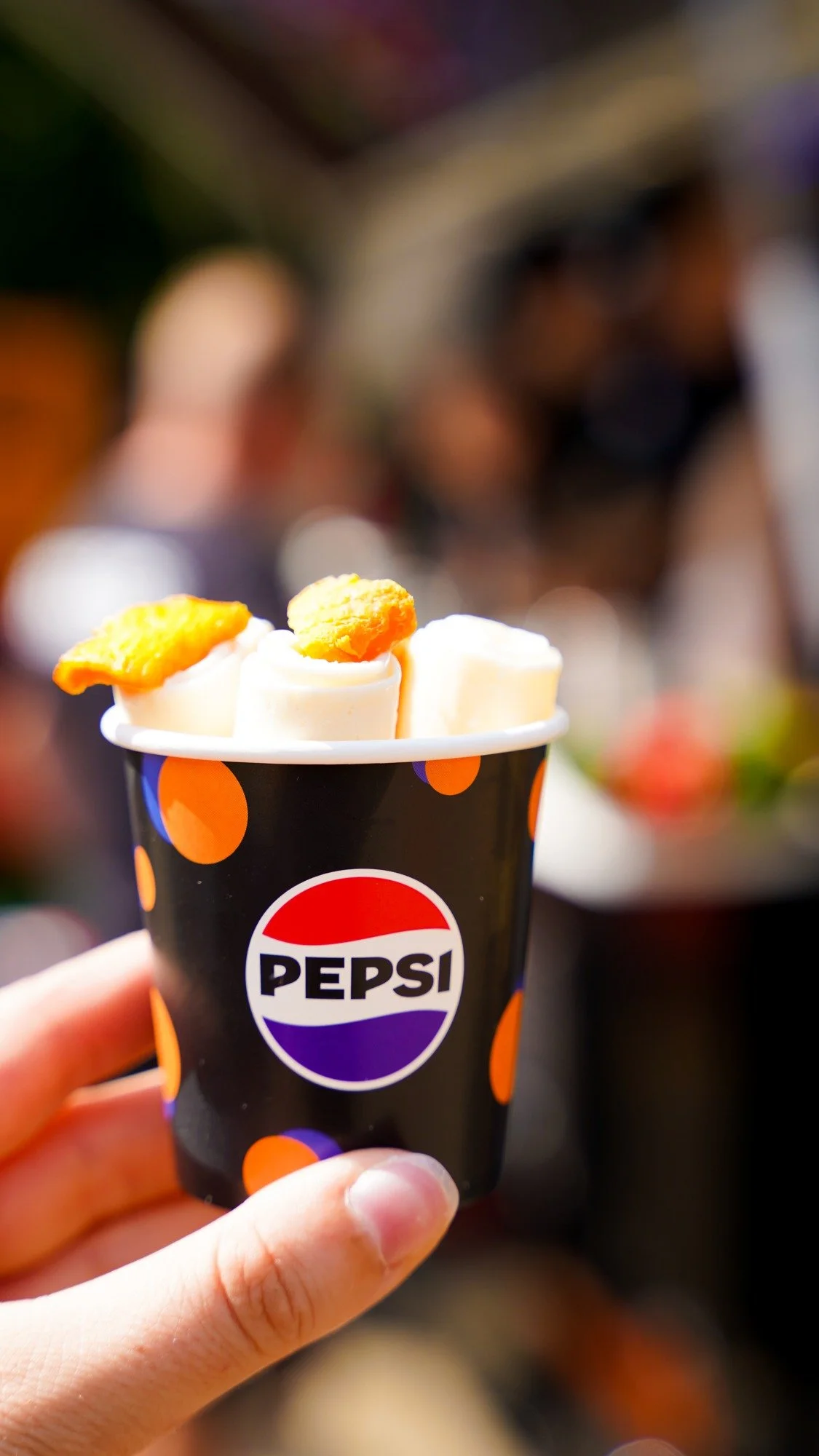 Custom ice cream rolls in a Pepsi branded cup