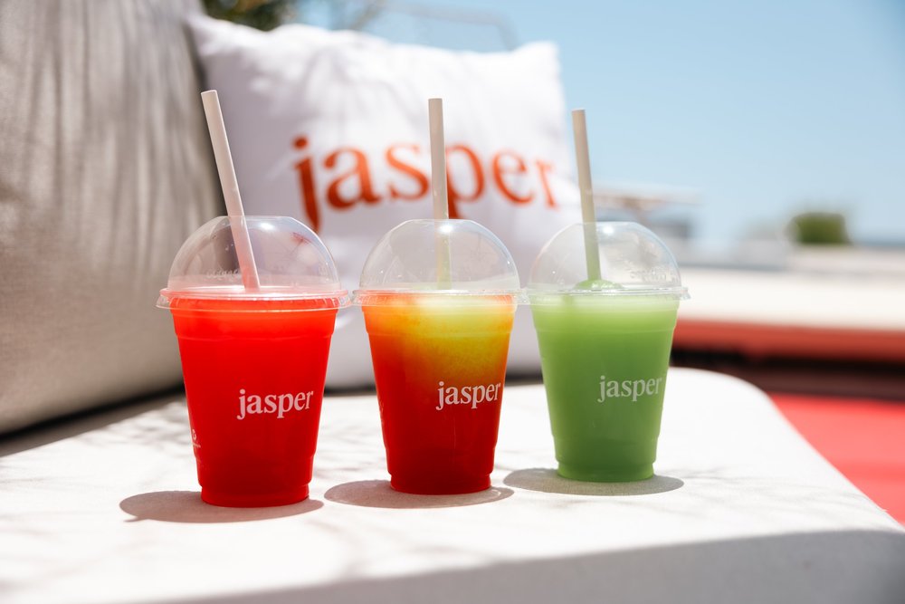 Three colourful slushies in Jasper branded cups