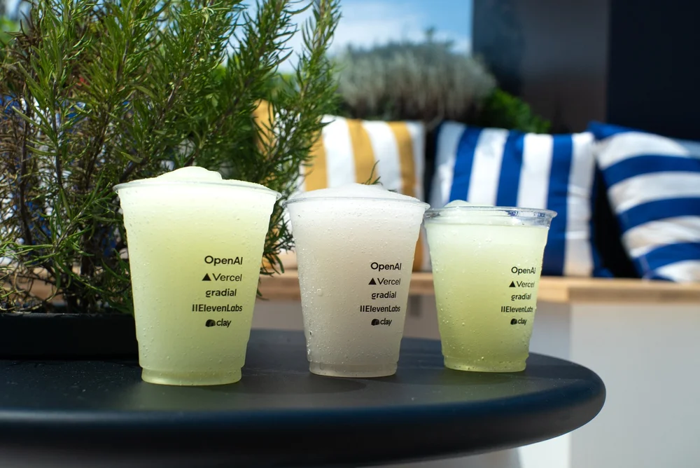 Three Vercel branded cups filled with frozen drinks at Cannes Lions