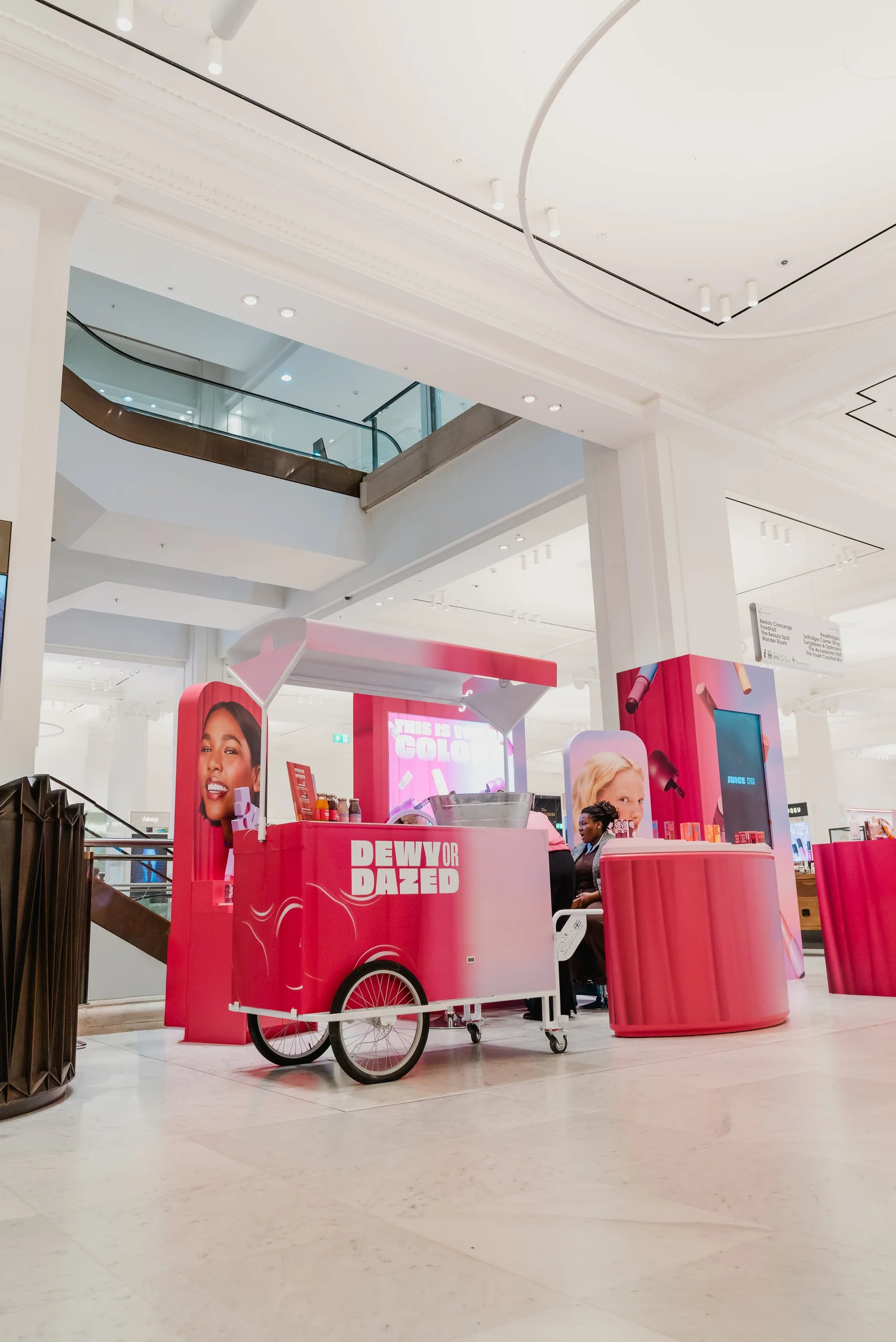 Benefit Dewy or Dazed branded pink cart at Selfridges