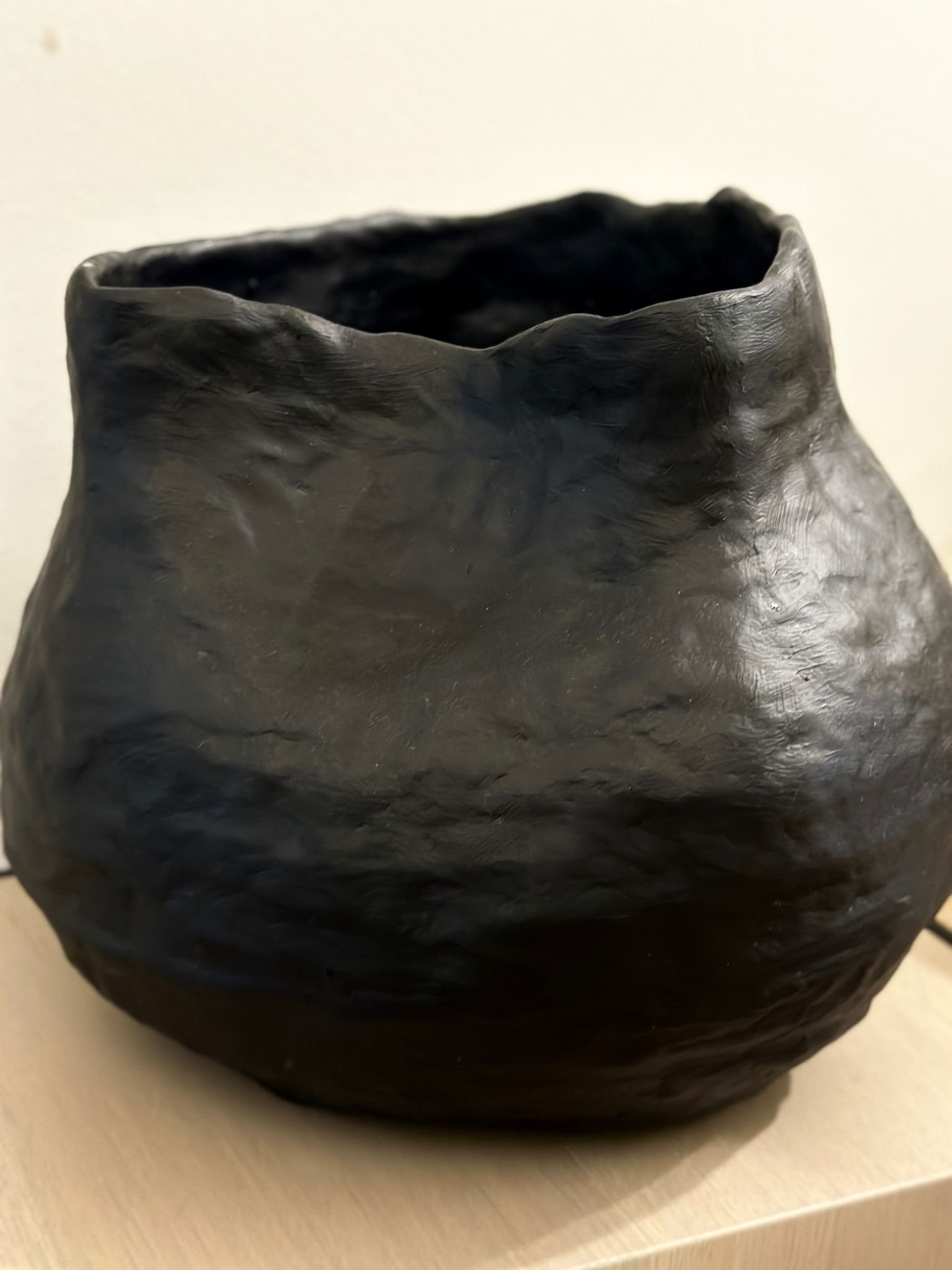 Immerse yourself in the fascinating world of ceramic art with our exquisite 'Night River' clay vase, which creates a calming atmosphere with its organic shape and artistic design