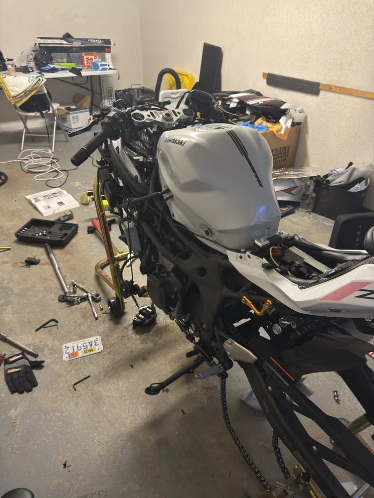 My ZX4 from the rear with its wheels and main fairings removed during the August 9, 2025 rebuild.
