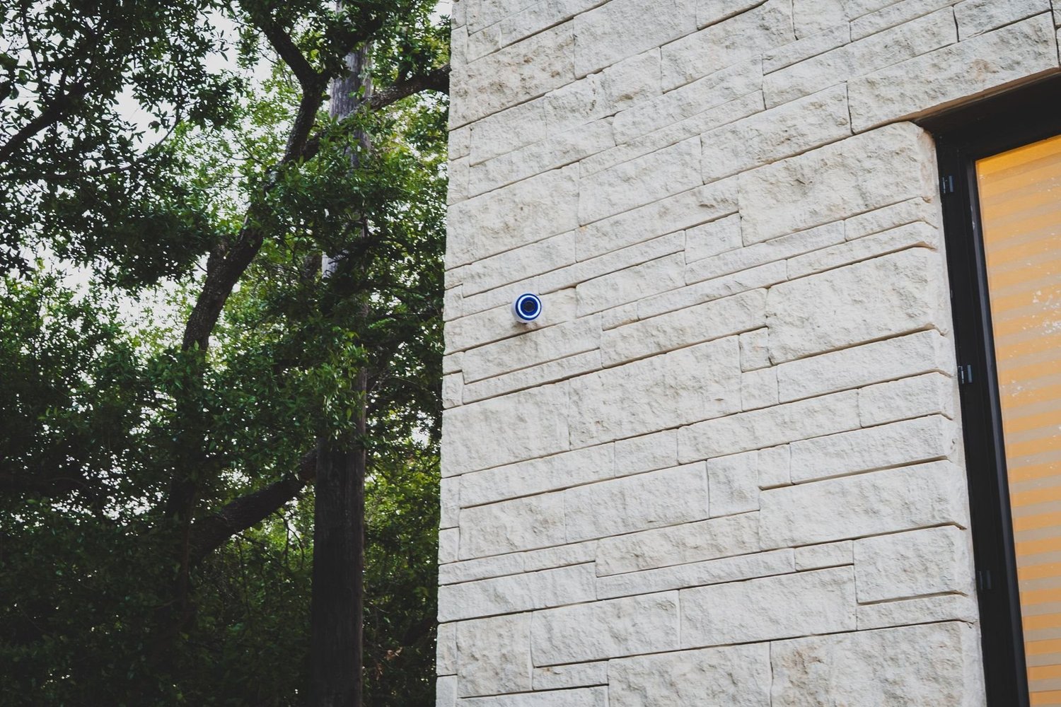 Security device on a limestone exterior wall