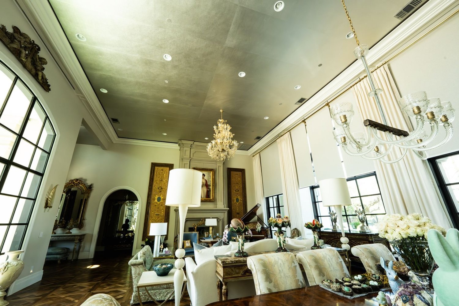 Great room with Ketra lighting, Lutron HomeWorks control, and Lutron shades