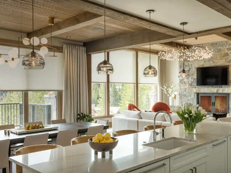 Kitchen and living space with wood beams: Ketra A20 and D30 fixtures, Sivoia shades and HomeWorks QSX