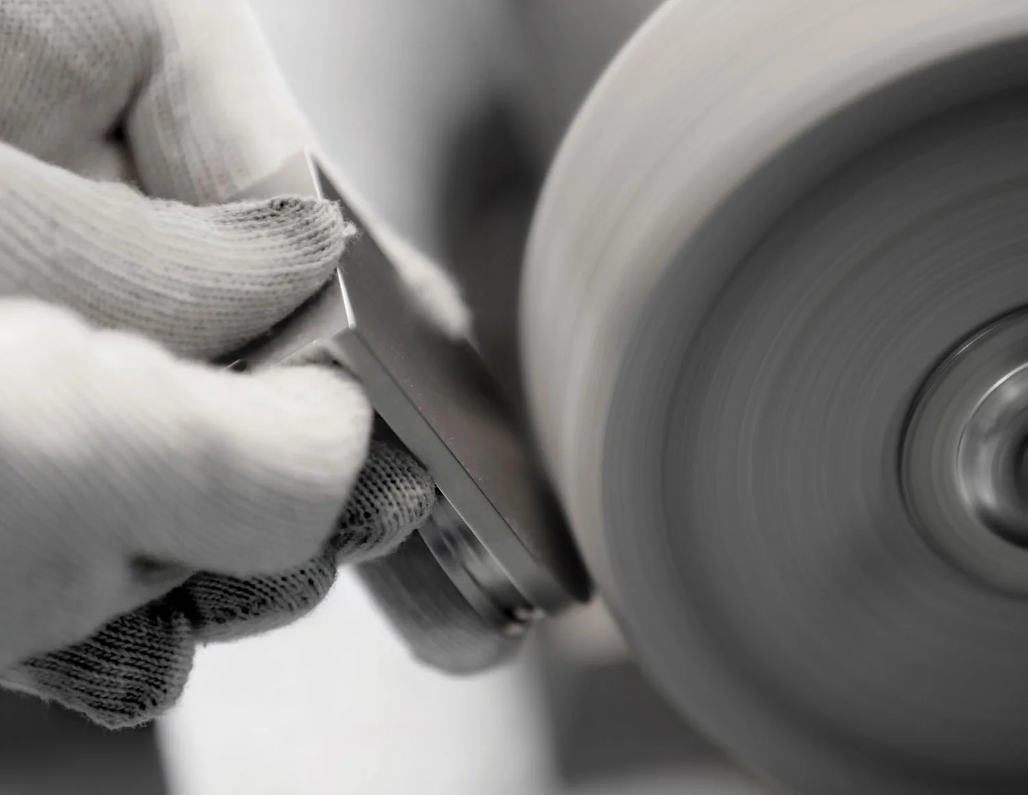 Hand finishing a Palladiom bracket