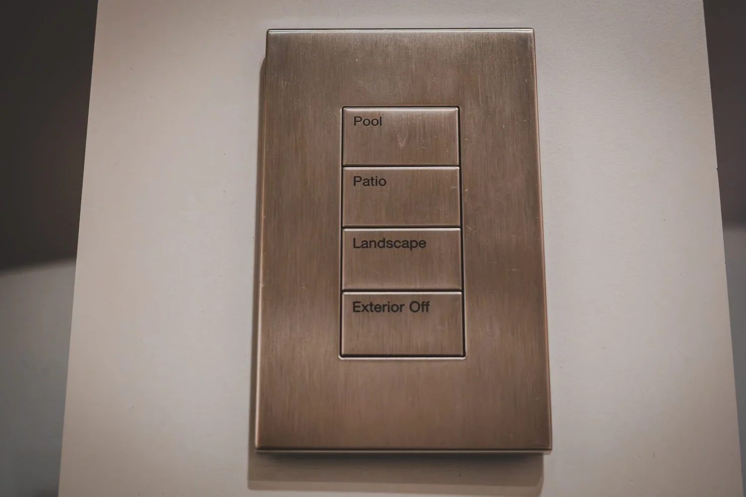 Engraved keypad with buttons labeled for outdoor and landscape scenes