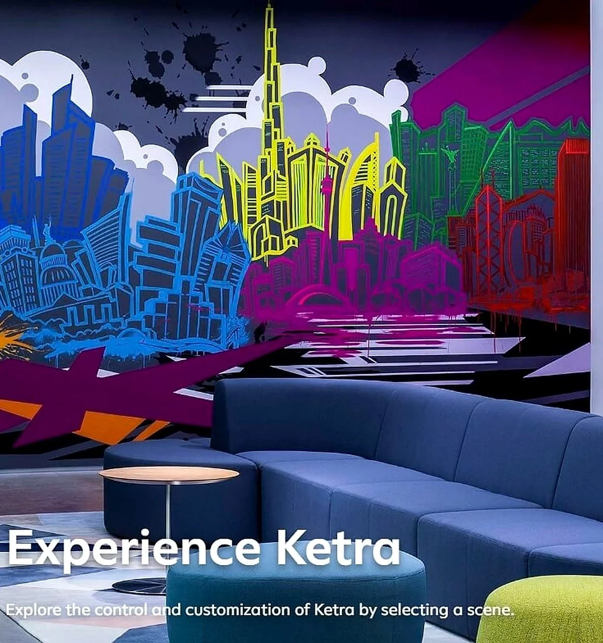 Colorful mural of a city skyline with various buildings in shades of blue, yellow, pink, green, and red, with abstract patterns and a dark sky background, in a modern lounge area with a blue sofa and small round table.