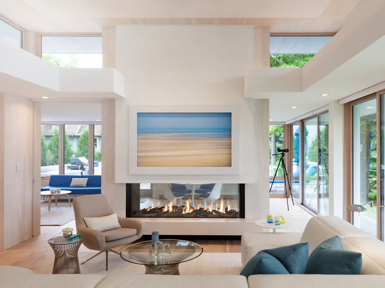 Living room with recessed fixtures (Private Residence, USA): Finire recessed fixtures and HomeWorks QSX control