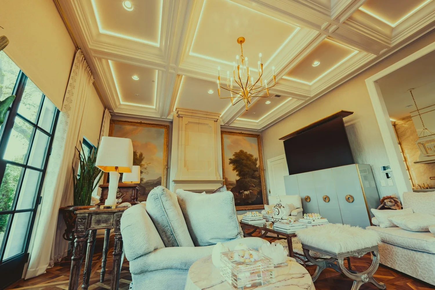 Living room with Ketra lighting and a wall-mounted television