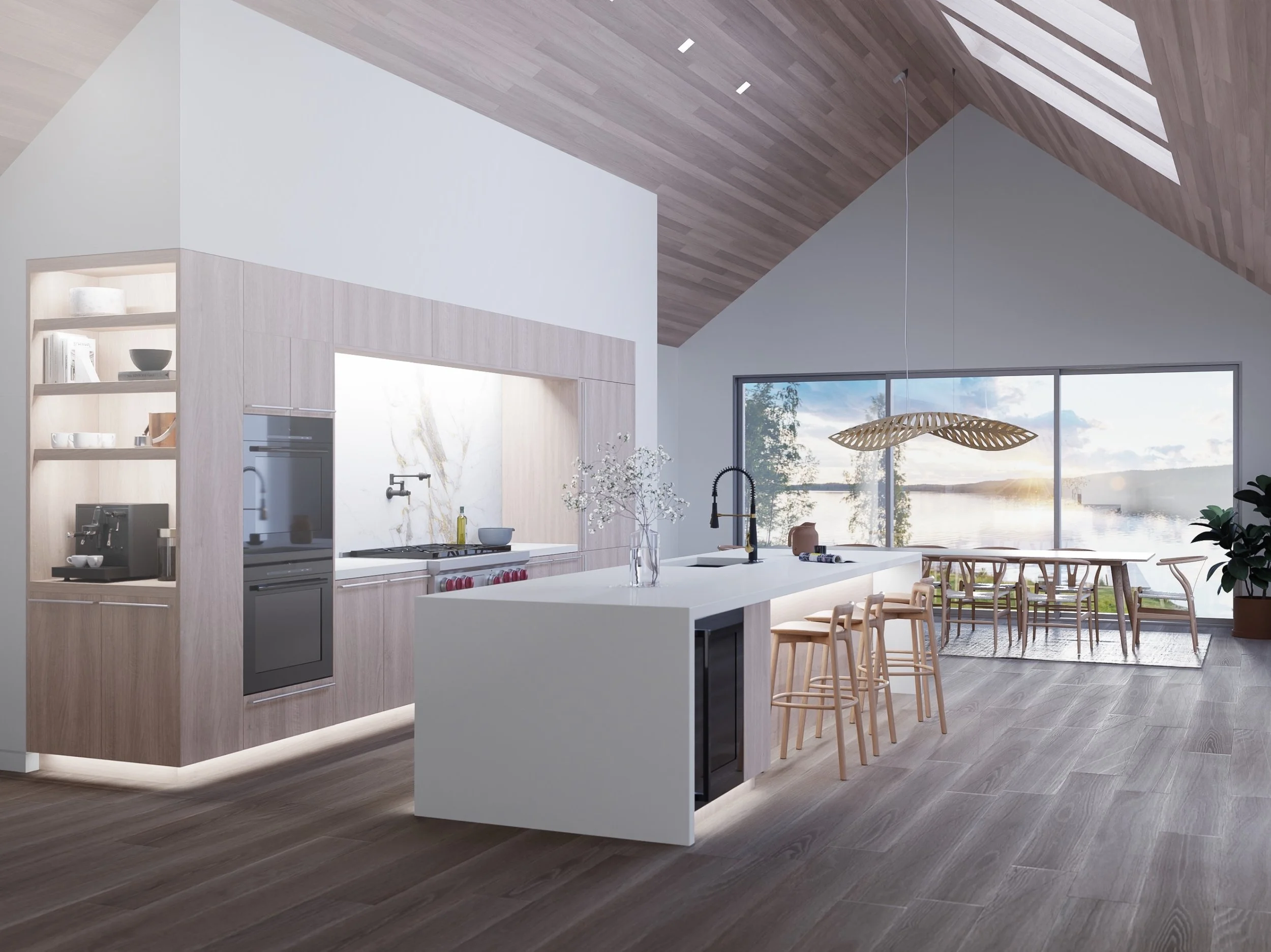 A modern vaulted kitchen and dining space illuminated by Lutron smart lighting and designed with expansive glass walls for natural daylight. The sloped ceiling with skylights floods the room with sunlight, while under-cabinet and shelf-integrated LED