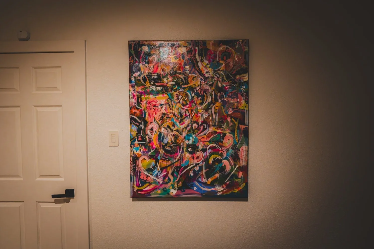 Painting lit by a focused picture light