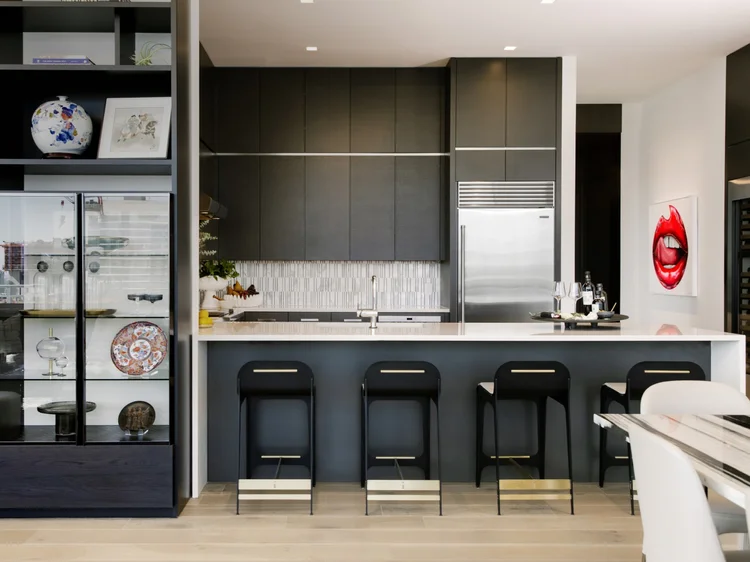 Kitchen with recessed lighting and QS shades (Seaholm Penthouse, Austin, TX): Ketra recessed lighting, QS shades and HomeWorks QSX