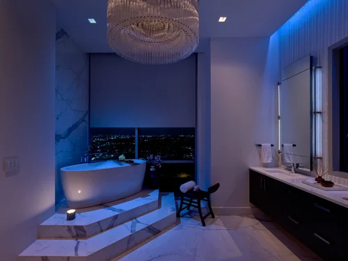 Bathroom with soaking tub and chandelier, Seaholm Penthouse, Austin, TX