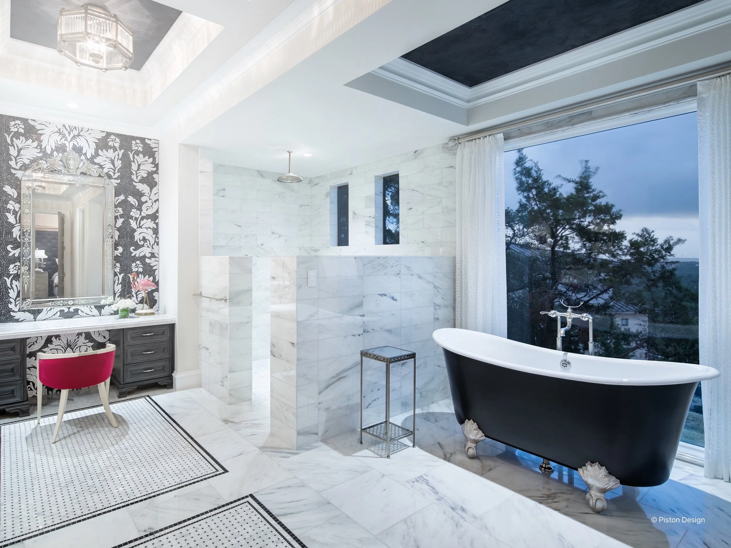 A striking luxury bathroom designed with Lutron smart lighting and motorized sheer shades to balance elegance and natural light. A dramatic black freestanding clawfoot tub anchors the space beside floor-to-ceiling windows, framed with sheer shades fo