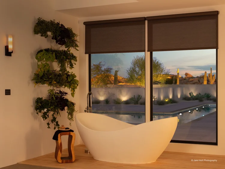 Bathroom with motorized shades (Private Residence, Southwest, USA): Triathlon shades and HomeWorks QSX control