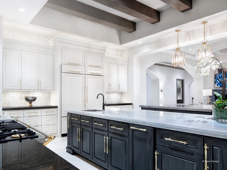 Kitchen with pendants and wood beams (Texas Hill Residence, Austin, TX): recessed downlights, pendants and HomeWorks QSX control