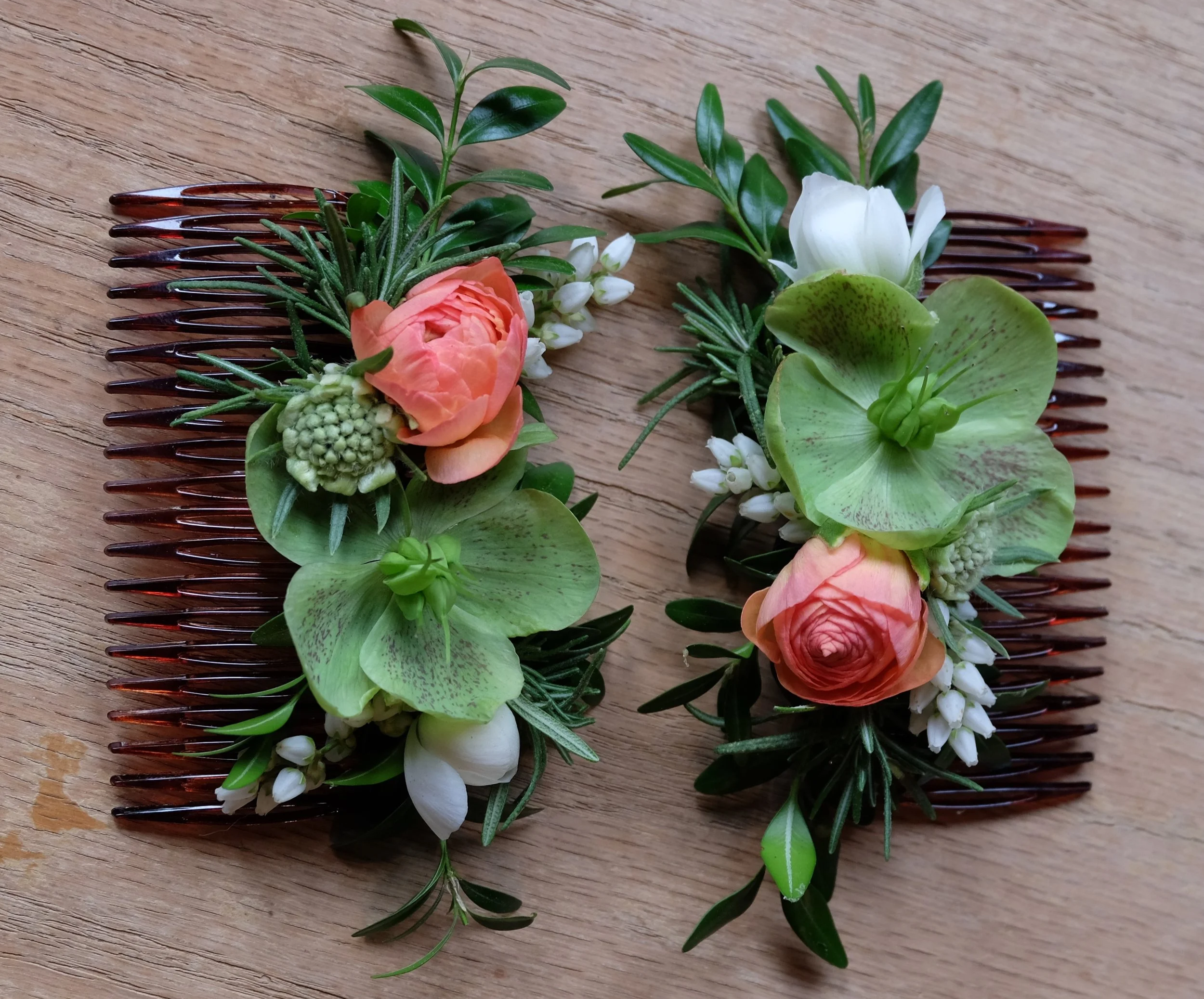 Floral hair combs in green and peach with hellebore, ranunculus, and scabiosa