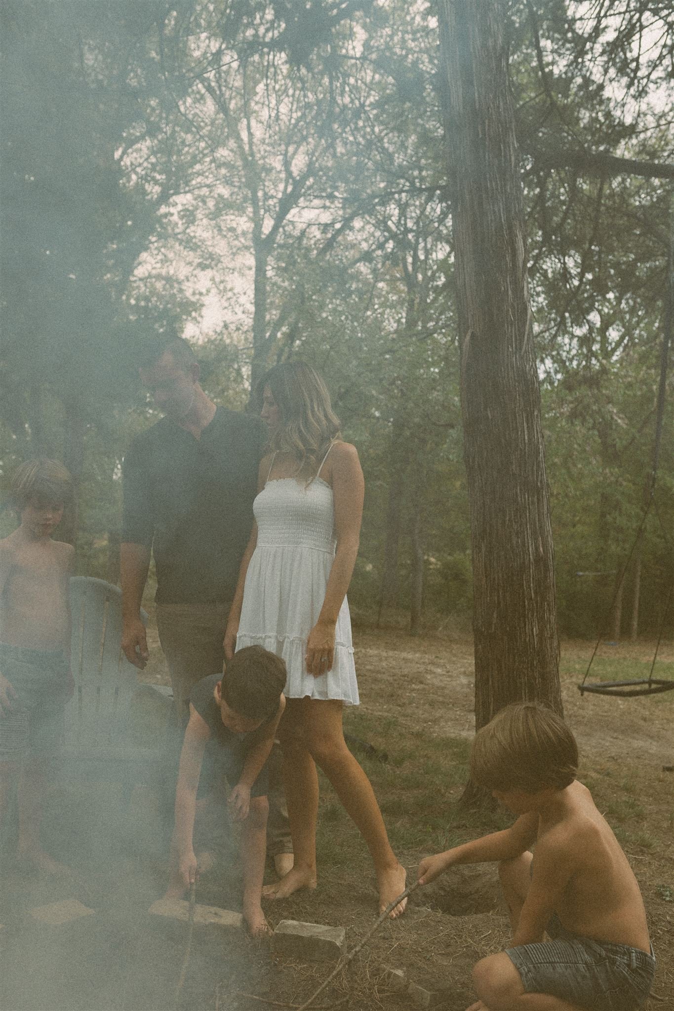  Family outside by a fire in allen, texas 