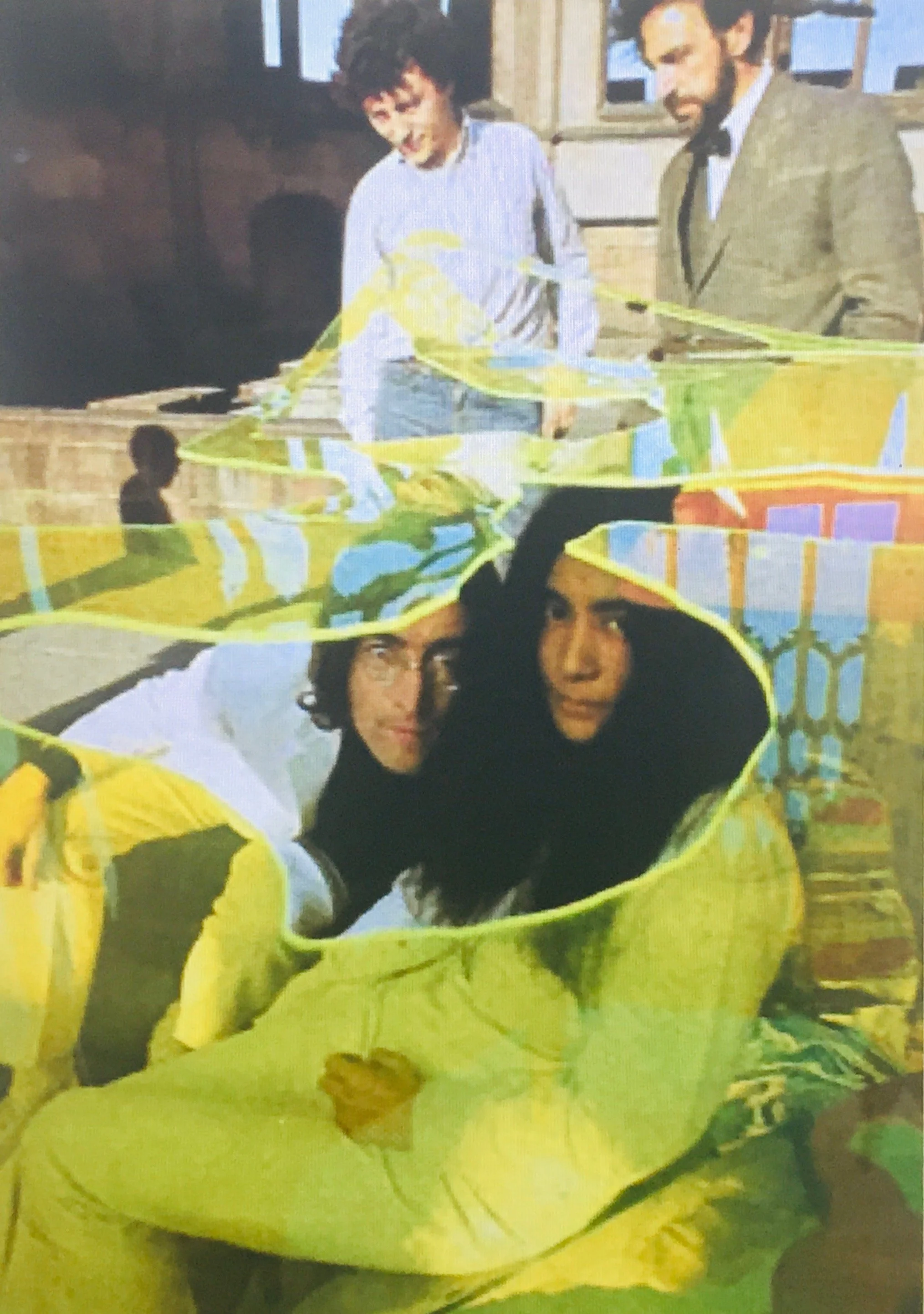 John Lennon and Yoko Ono sitting on a Benjamin sculpture. Anthony and the editor of Sculpture International, Fabio Barraclough, are in the background, 1968. Photo: Anthony Fawcett