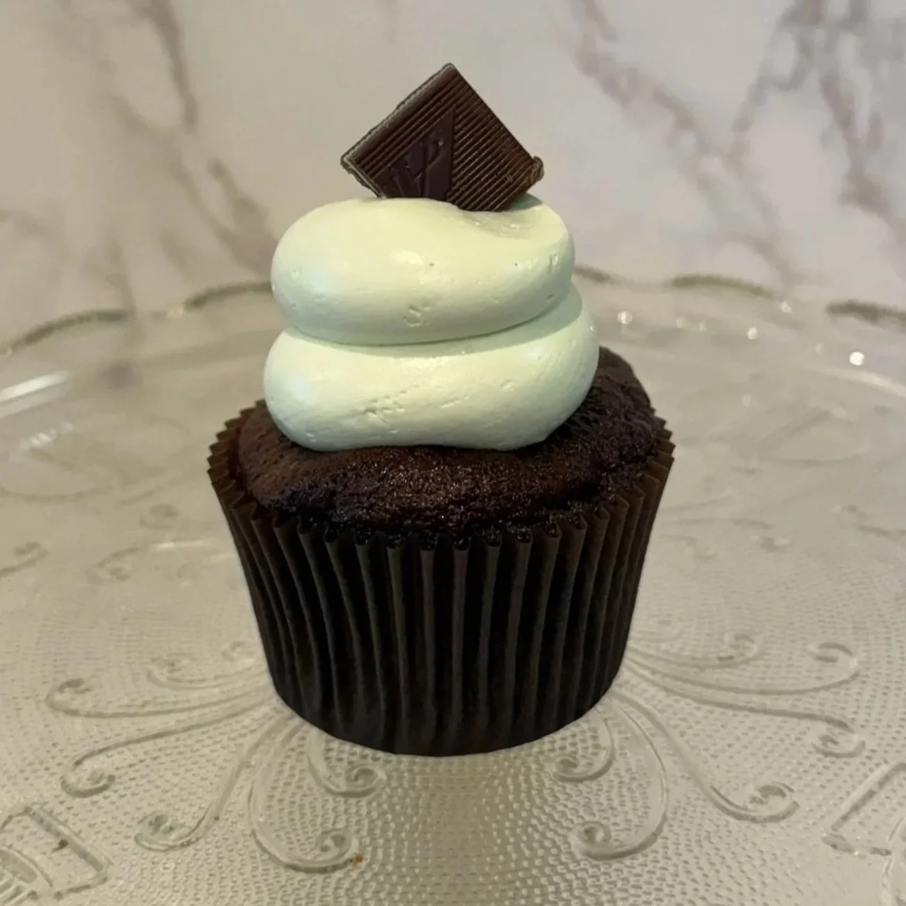 Chocolate cupcake with mint candy on topMint