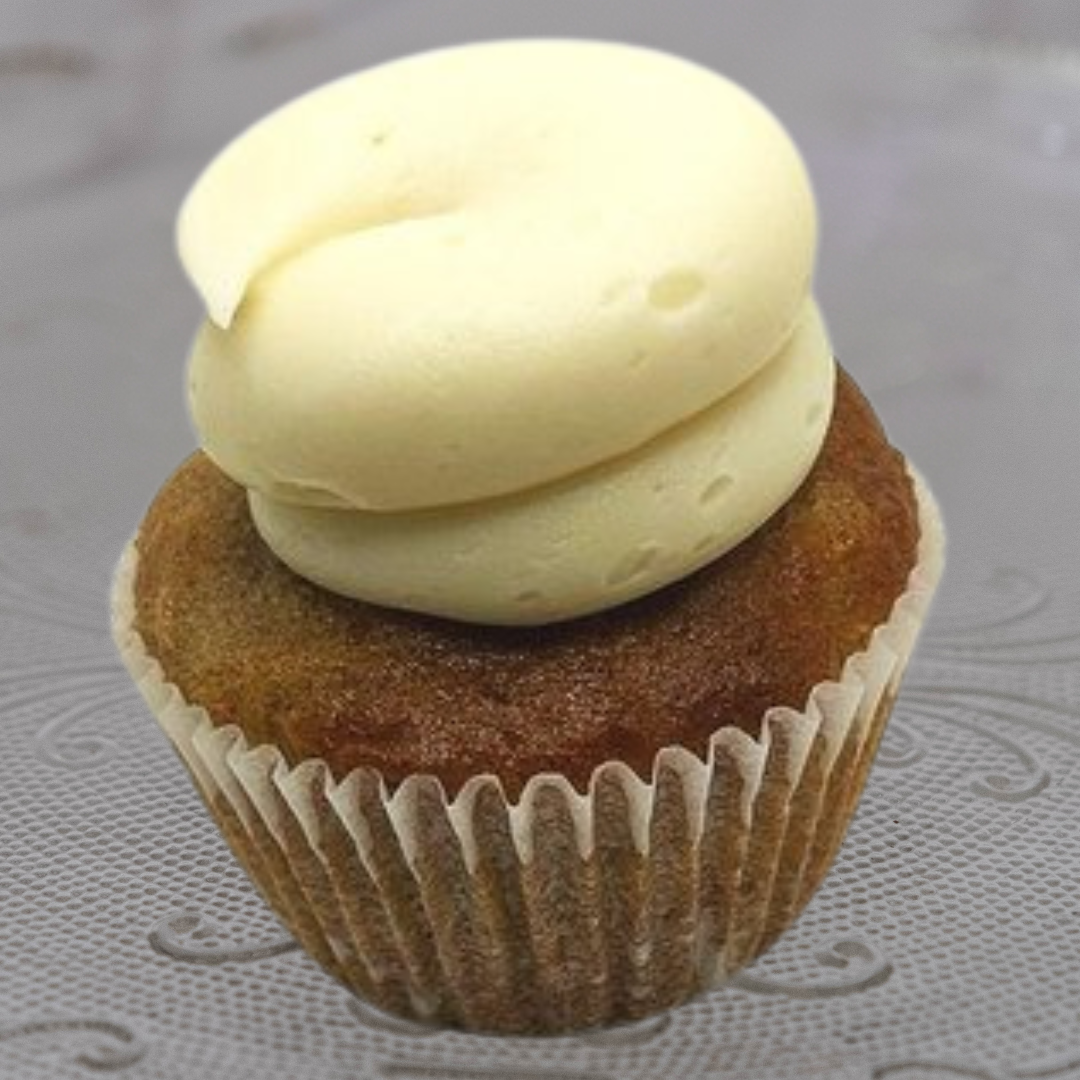 Chocolate cupcake with white frosting on top