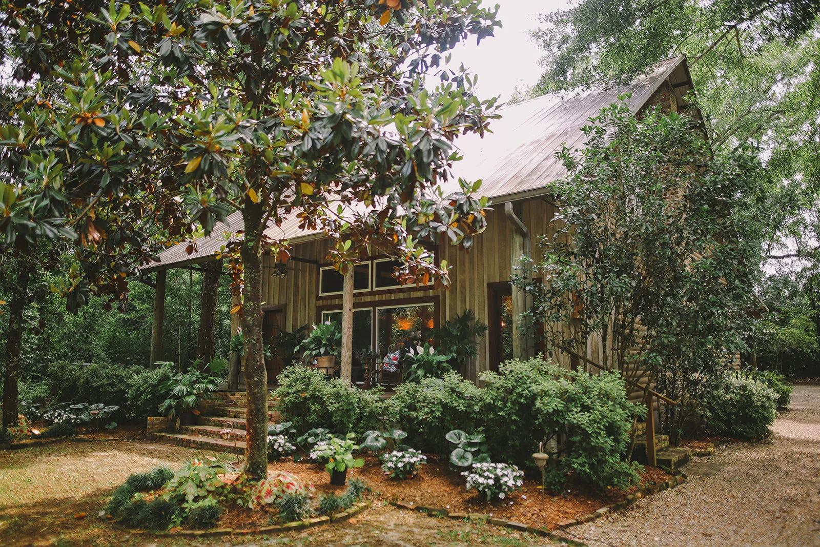 The Log Cabin at The Henry Smith House estate, a historic cabin renovated as a rental home for event guests.