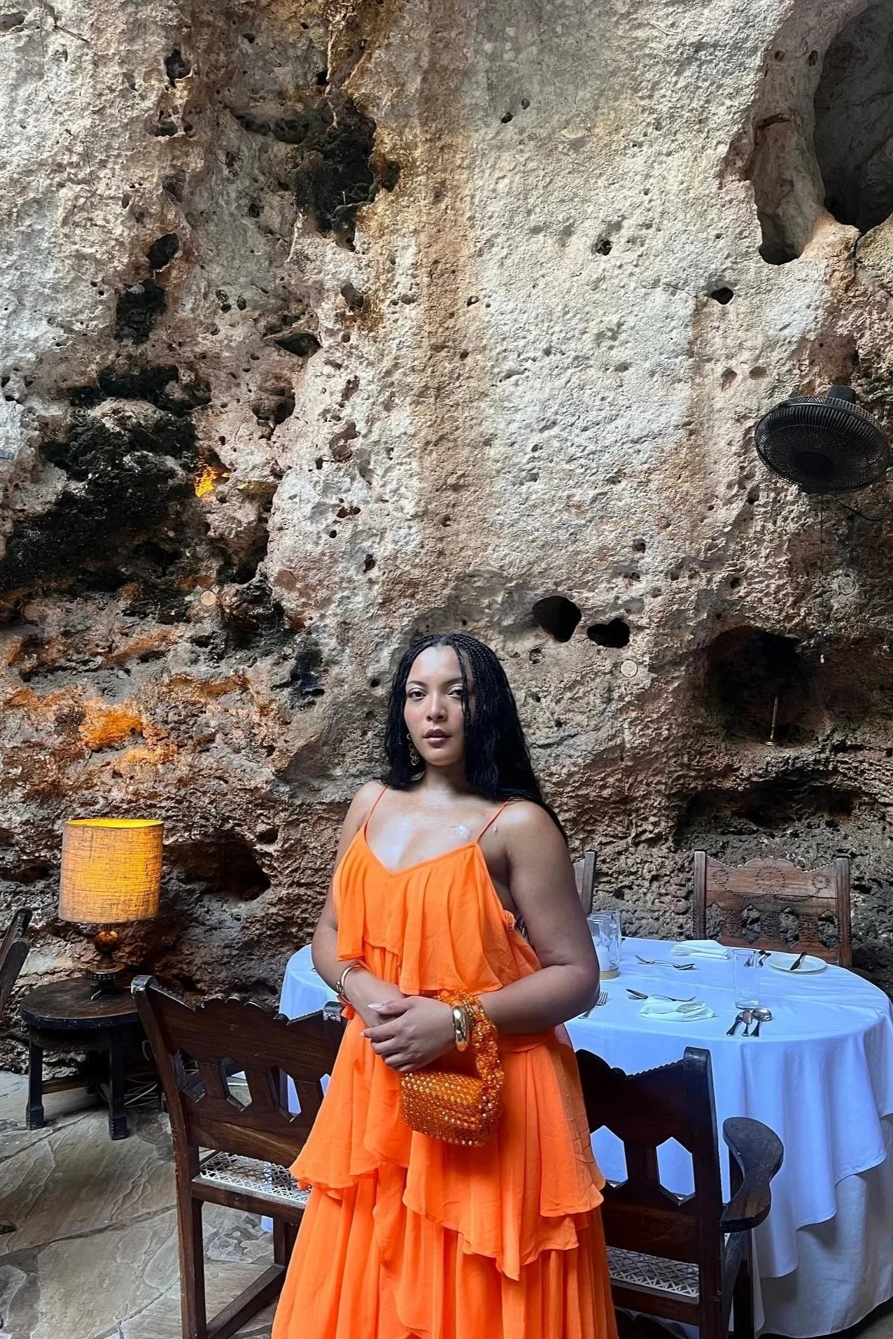 woman in orange dress