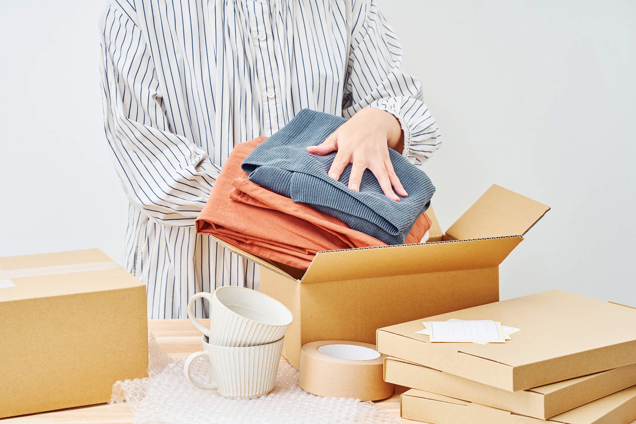 decluttering - organizing-unpacking clothes and cups