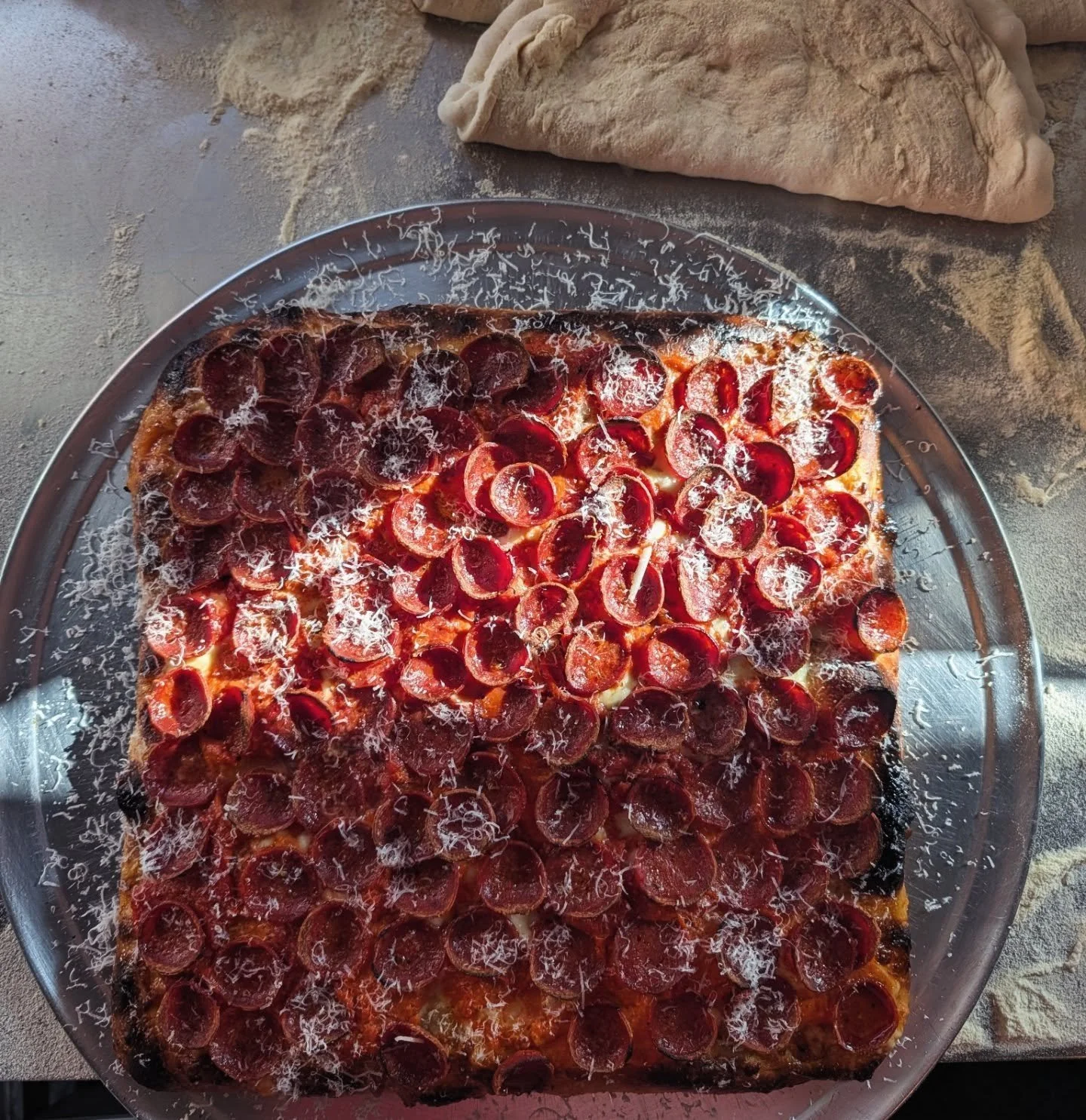 A few from this week. 
1. Spicy pep Sicilian style. Our gochujang vodka sauce, our own custom all local pepperoni 
2. Whipped lemon ricotta, wilted spinach, Doenjang cauliflower, braised scallions, chive oil, our hot oil, parmigiano reggiano. No name