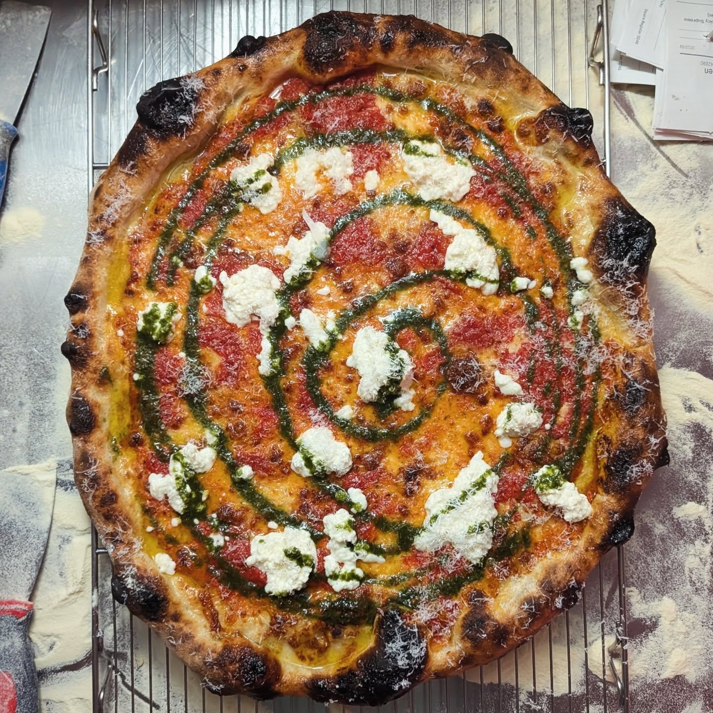 Tie dye. A four year saga. Gochujang vodka sauce, ft. Copeland Distillery from just down the road, homemade stracciatella, our marinara, our basil oil, our sourdough and organic crust made with a dash of local organic grain we milled into flour in th