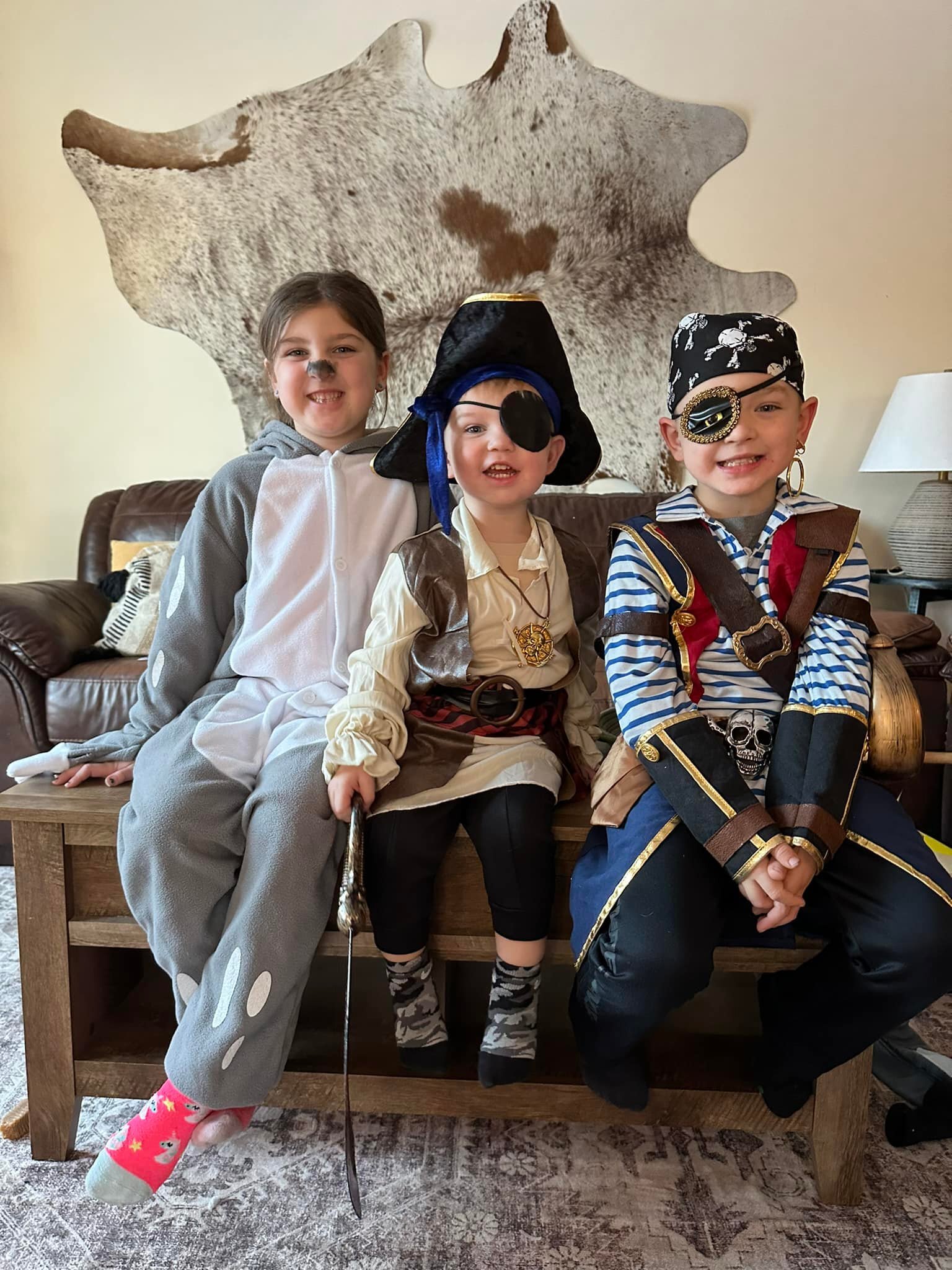 Happy Halloween from a bad pirate, a good pirate, and a sloth. 🏴&zwj;☠️ 🦥 ⚔️