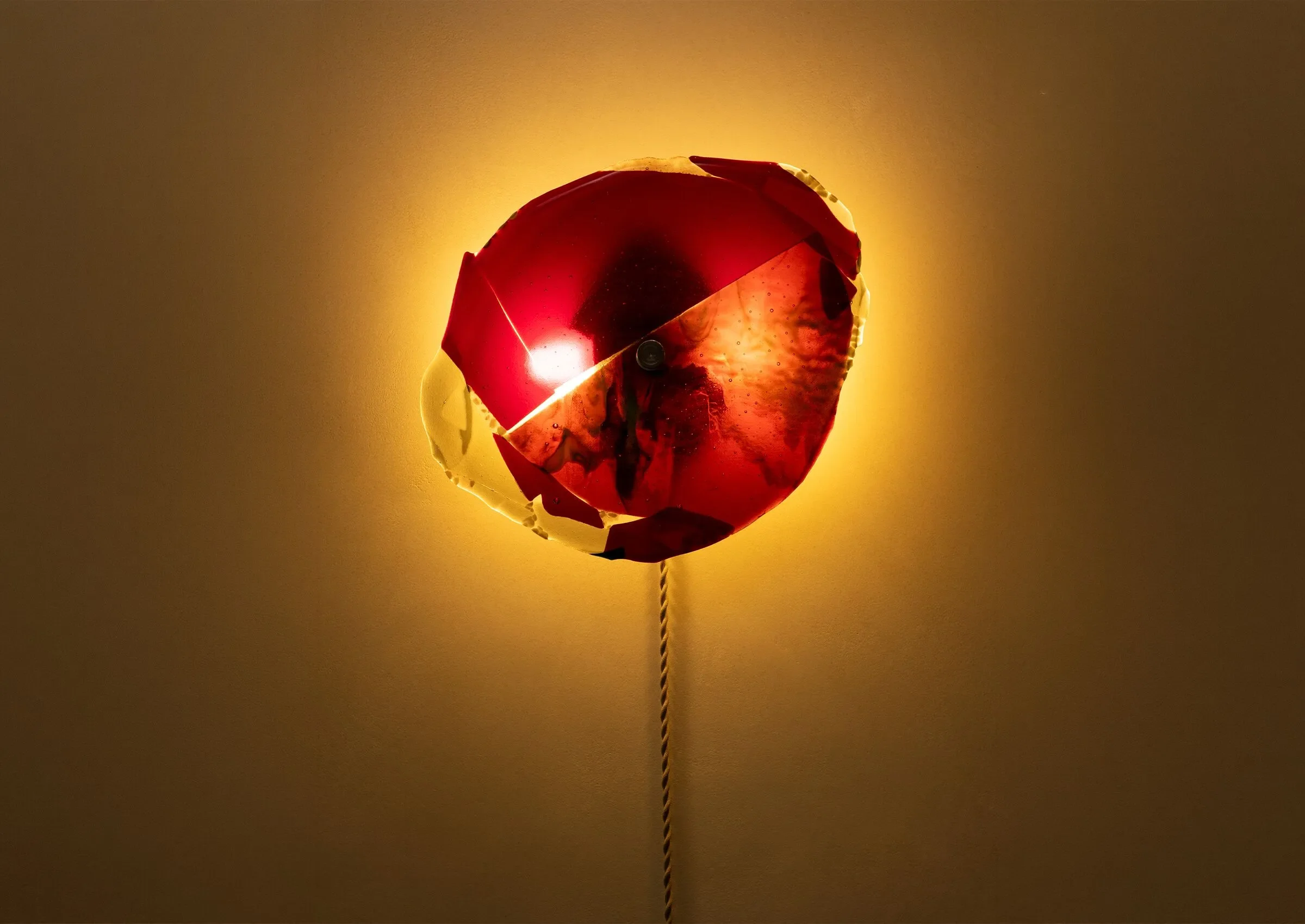 On view at Future Perfect / Lava Fire Glass Sconce, 2026 / Fused glass / 12 x 10 in
