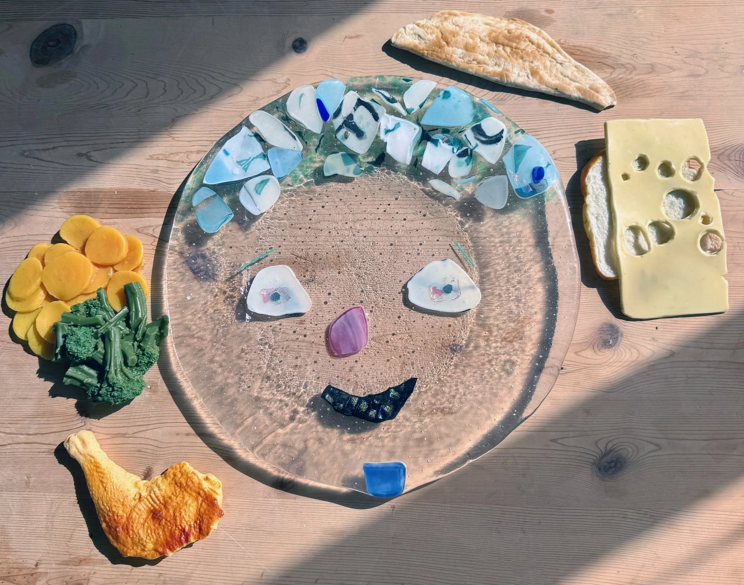 Facey Plate, 2026 / Fused Glass / 12 ½ inches