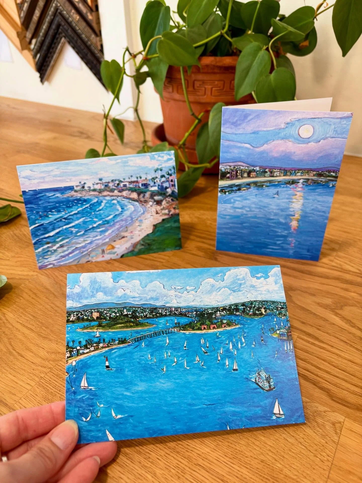We&rsquo;re so excited to have @michaelajeanart greeting cards back in stock! These are just a few of the seven different styles we have and they&rsquo;re all stunning! And they have the artist info and title on the back on each! 💙